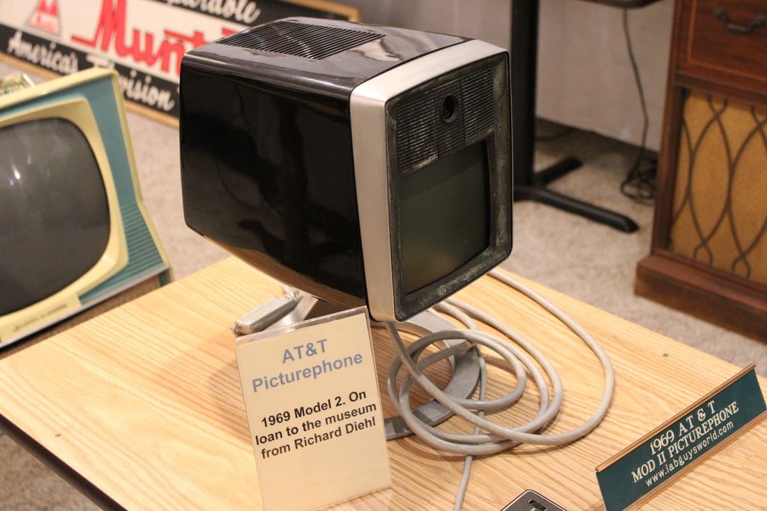 A boxy 1969 Picturephone with a small screen in a museum